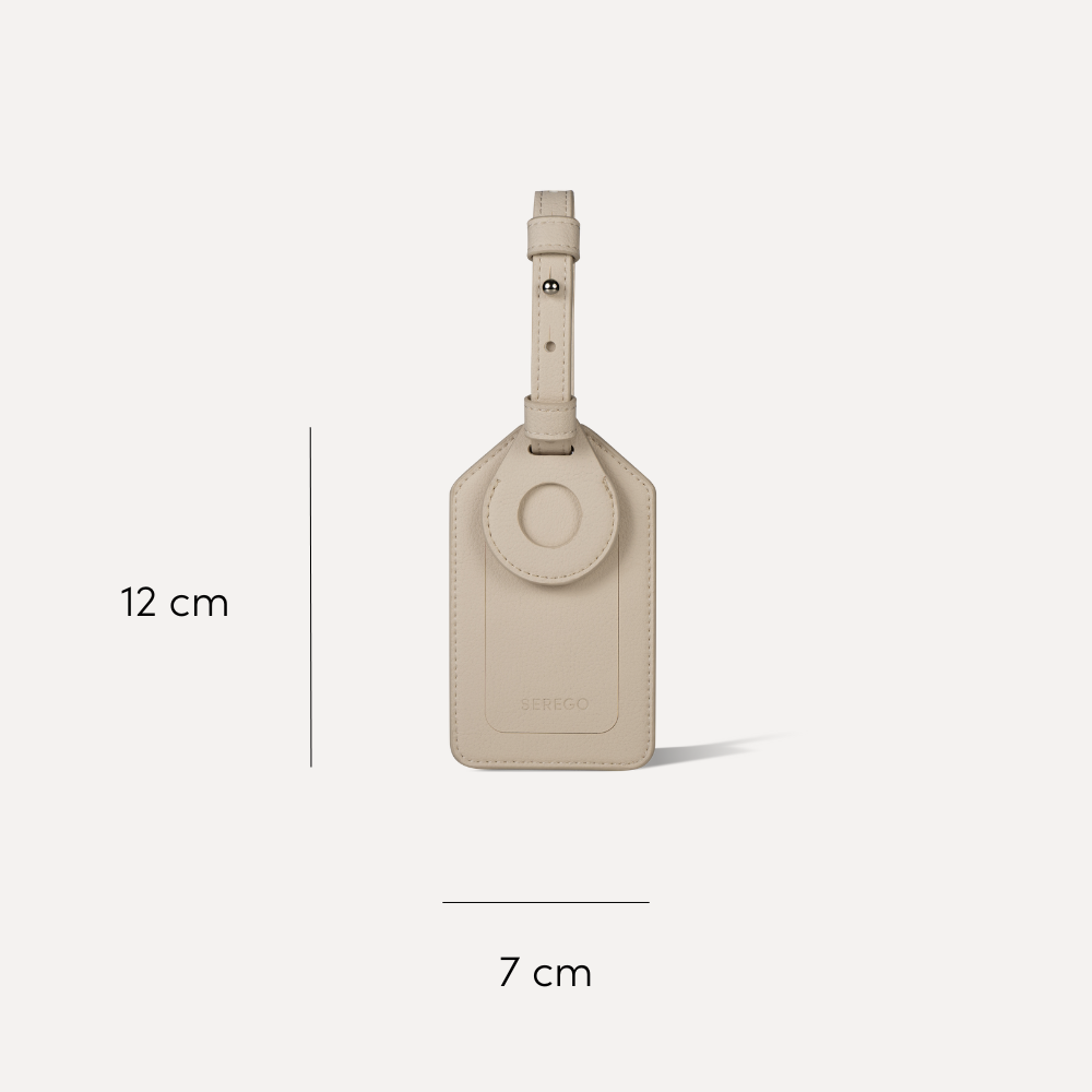 SEREGO vegan leather luggage tag showing dimensions 12 by 7 cm, includes AirTag holder and secure strap for luggage and bags