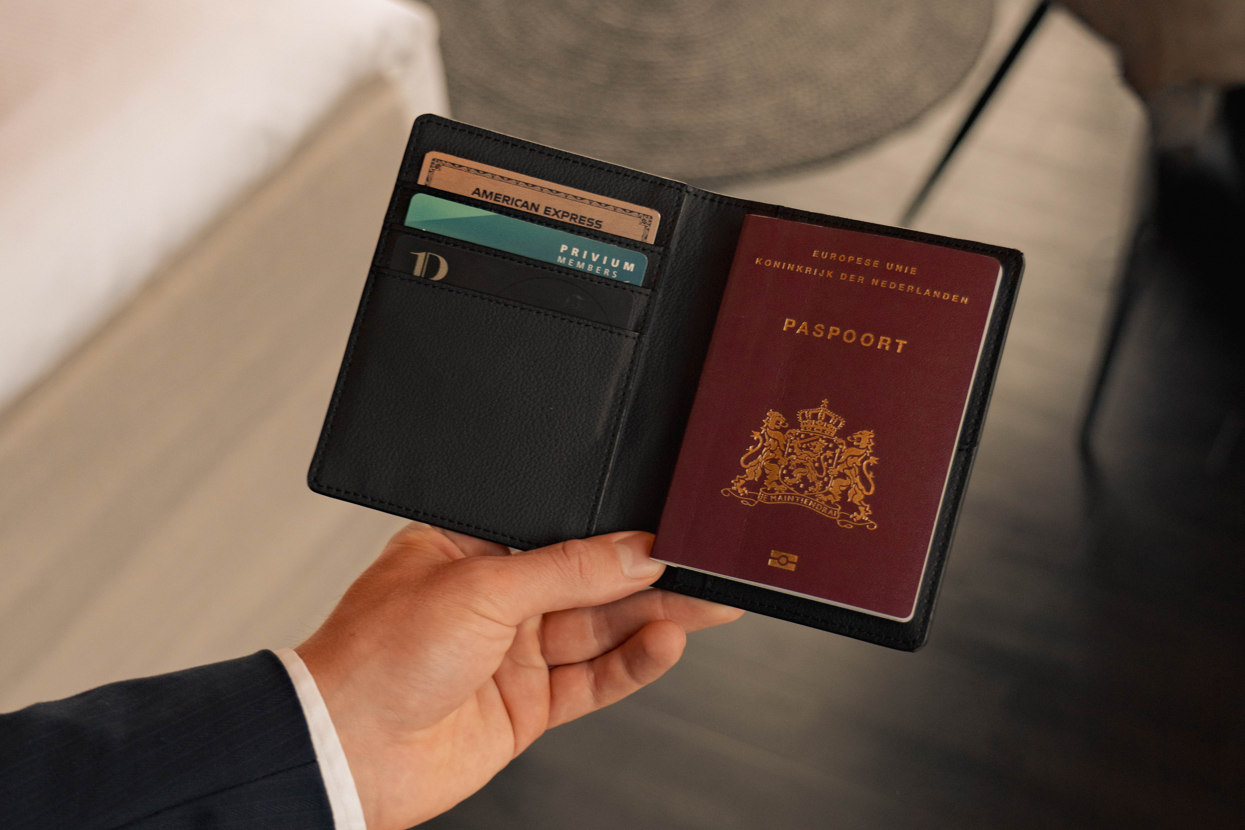 SEREGO beige vegan leather passport cover open, showing card slots and passport holder design for organized travel