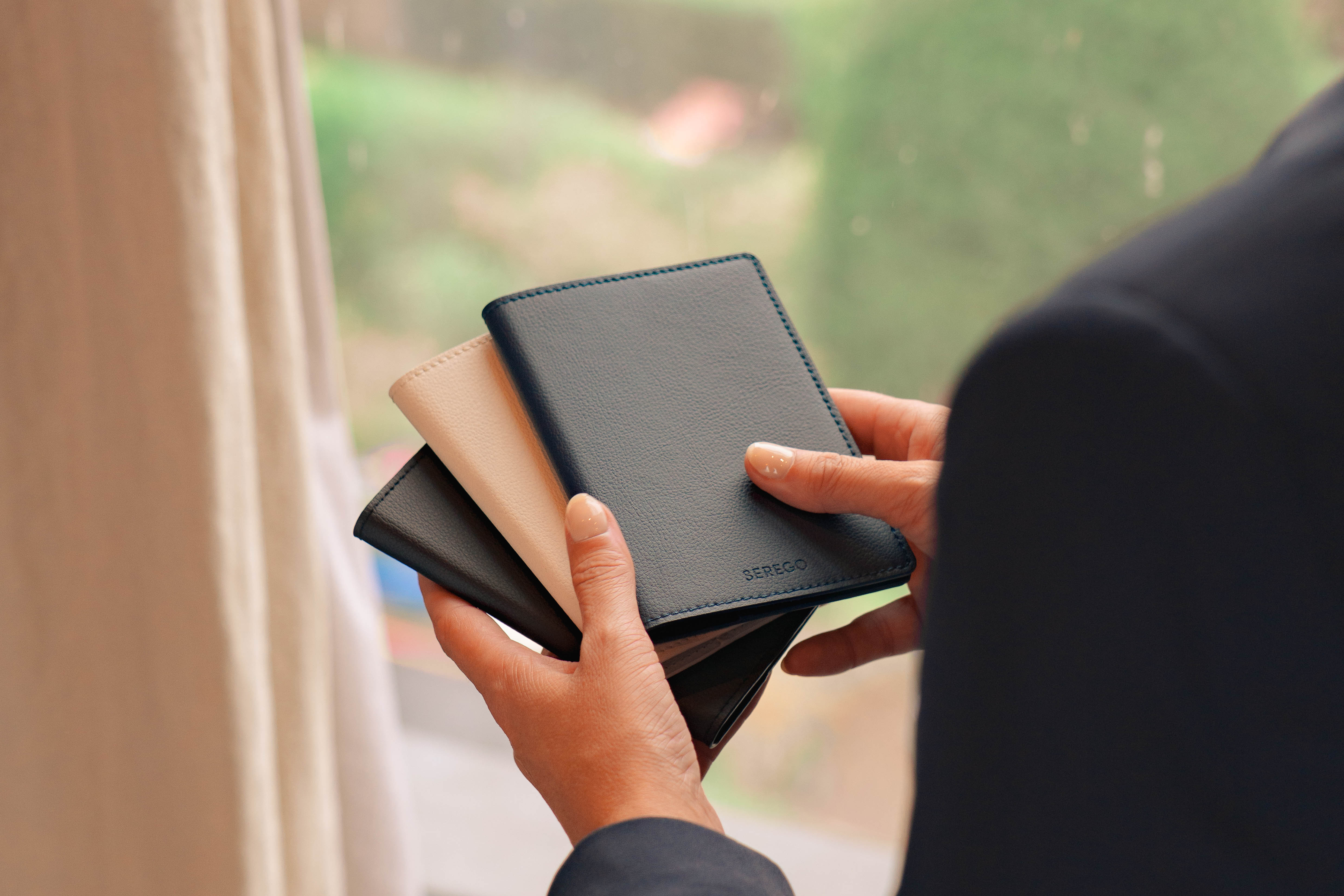 SEREGO black vegan leather toiletry bag in use, stylish travel accessory suitable for men and women